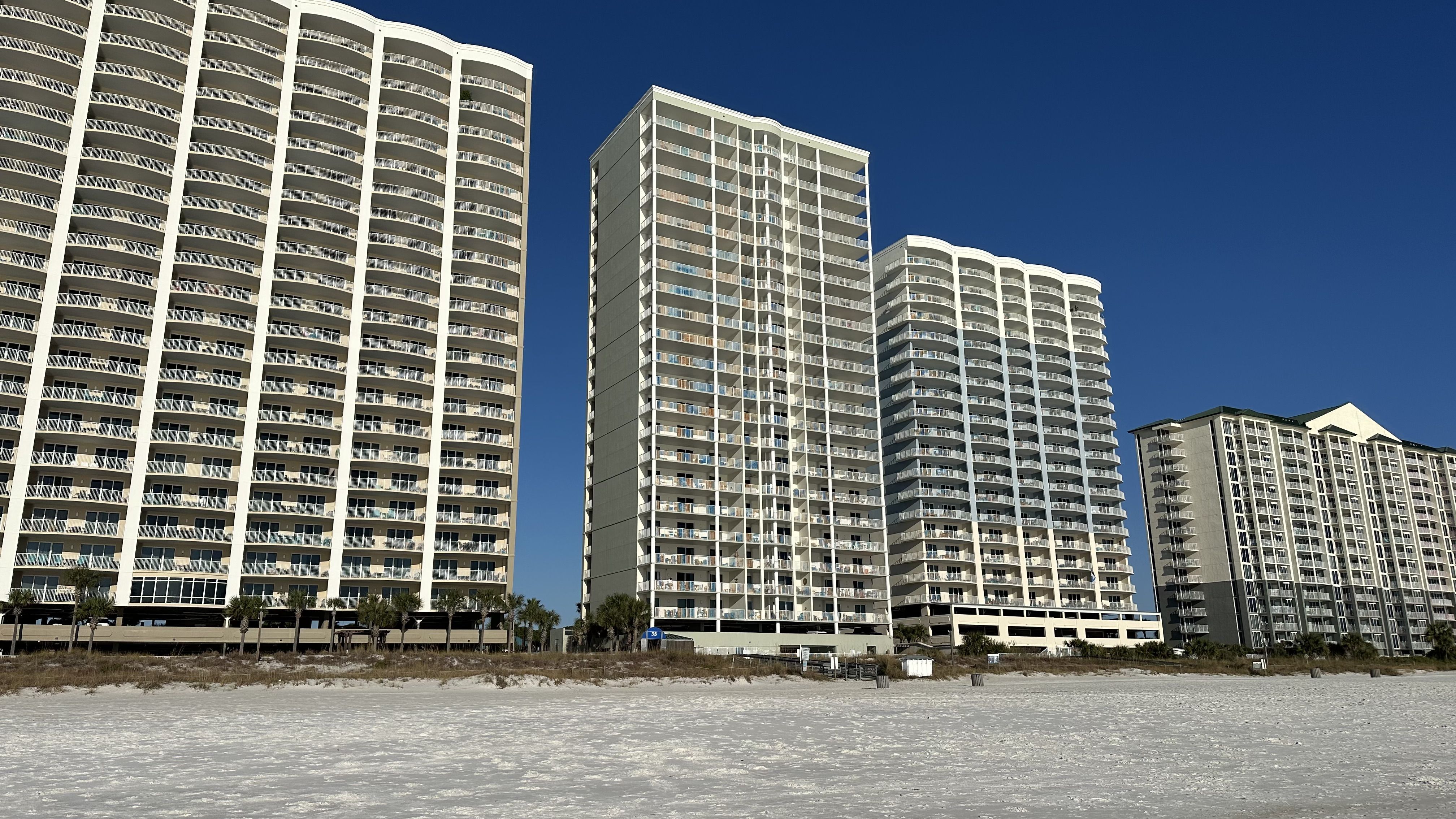 Ocean ritz is the center condominium between Ocean Villa and Tropic Winds in Panama City Beach.